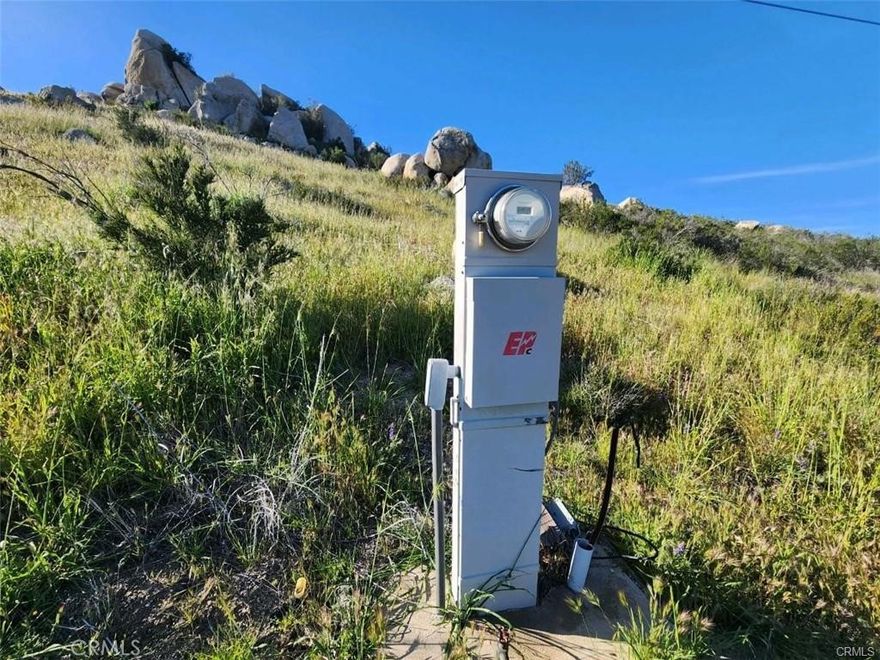 WATER.  ELECTRICITY.  SEPTIC.  PROPANE.  GRADED PAD.  TRAILER.  STORAGE CONTAINER.  EVERYTHING YOU NEED IS ALREADY IN PLACE.  SELLER SAYS BRING ALL OFFERS NOW AS THEY ARE READY TO DEAL!  AND SELLER WILLING TO CARRY!  Fully functioning well, 10,000 gallon water storage tank, electric meter, septic system and graded pad.  Located just 30 minutes from Temecula, this property is a very secluded and private property with public land on the north side.  Lots of room for horses or other animals.  Potential for a 2nd well.  Ever wonder what makes Aguanga so wildly wonderful?  Check this property out and see for yourself!  Almost 20 acres of secluded property with a large graded pad with plenty of room to build your forever home with a pool!  And, yes, this property has a electric meter, a septic system and a producing well on the property.  Well is 700 ft deep and produces 4,320 gallons per day.  Galvanized water tank holds 10,000 gallons.  There is also a large 40 foot highboy storage container and a 25 ft 5th wheel (needs some work) camper on the property that are included!  Potential for a pond, horse farm, bird farm, R/C car and plane activity, and an archery or shooting range.  See outstanding sunrises and tremendous views of the valley below.  And check out the forever views to Palomar Mountain, Reed Valley, Billy Goat Mountain and Cahuilla Mountain in the distance.  Abundant seasonal flora, fauna, birds and wildlife.  This property has everything for everyone.  Don't let it slip through your fingers.