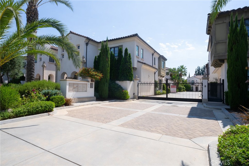 Located in the highly sought out award winning Arcadia School District, this gated community gem is turn key and ready to move in! This corner unit mid century modern home includes meticulous upgrades throughout with an open floor plan, high ceilings, and recessed lighting. This masterpiece boasts 3 bedrooms and 3.5 bathrooms, gourmet kitchen with built-in Viking stainless steel appliances, 8 ft solid wood doors, primary bedroom with walk in closet, primary bathroom with separate soaking tub and shower, dual sinks, hardwood floors, iron bar staircase, tankless water heater, and attached two car garage with direct access. The expansive living room with sliding door opens to a private yard creating an ideal space for memorable evenings. Minutes away from Santa Anita Park, Westfield Shopping Mall, Golf Course, and Amazing Restaurants.