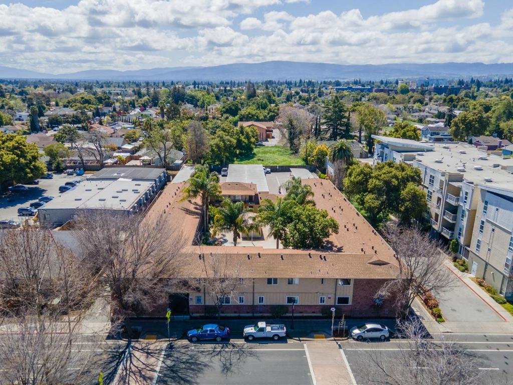 SELLER FINANCING - 10 year fixed 4% IO with 25% Down - SB 386/721 work has been done - MICHAEL HENSHAW OF Marcus & Millichap has been exclusively selected to market for sale Aequitas Apartments, a 100% affordable housing 40-unit residential community located at 1760 Bay Road in East Palo Alto, CA. Situated on 1.03 acres, this property was originally constructed in 1964 and offers approximately 22,350 rentable square feet, featuring a mix of studio, one-bedroom, and two-bedroom floor plans. Please refer to the unit mix page for a complete breakdown of unit types. This professionally managed complex has been well maintained, with its exteriors, courtyard, and landscaping in excellent condition. Located in the heart of the Bay Area, Aequitas Apartments is a prime rental option for Peninsula residents, offering close proximity to major employers, transportation corridors, shopping, dining, and entertainment.