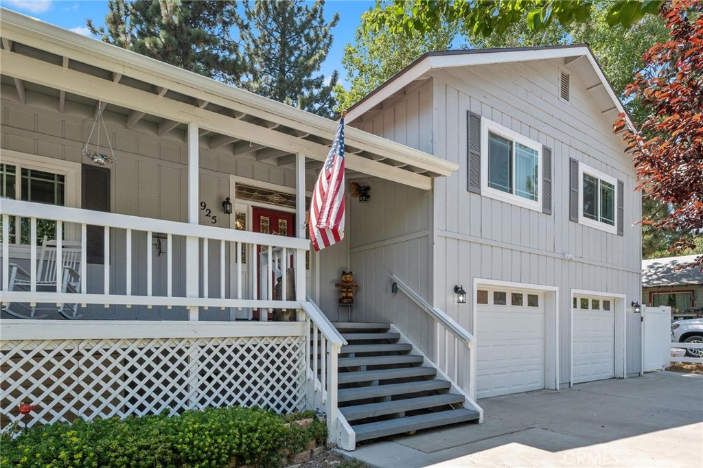 Welcome home to Apple Avenue, situated up above in the cute town of Wrightwood! This absolutely stunning home features: Almost 2500 sf. of living space; 3 bedrooms and 3 bathrooms; Spacious front deck overlooking the front yard; Gorgeous wood/glass door that flows into the entryway which leads into the living room; Living room is complete with vaulted ceilings, large window, and beautiful stone fireplace; The dining room is open to the living room and kitchen; The remodeled kitchen is light and bright with grey cabinetry, subway tile backsplash, quartz counter tops, stainless steel appliances/sink, and recessed lighting; Down the stairs are the two bonus rooms and guest bathroom (downstairs gen-suite anyone?!), along with the 2-car garage; Upstairs are the 2 spacious guest bedrooms, guest bathroom, laundry area, and primary suite; Primary suite is spacious and flows into the guest bathroom. Bonus features include: Upgraded dual pane windows, upgraded laminate and carpet flooring, upgraded designer light fixtures, interior and exterior neutral paint pallet, rebuilt backyard deck, large storage shed, central heat AND air conditioning, and so much more! Come and see for yourself...your new home awaits! Be sure to scroll down under features and checkout the virtual tours!