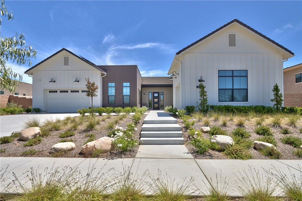 Situated in the new luxury gated community of Shawood and part of 2025's Detached Community of the Year, Sommers Bend, welcome to 32195 Daybrook Terrace. This home is located on a single loaded street and is on one the few premium large lots with open-panoramic views of the winery hills. This single-story ENSO floor plan has been fully upgraded to provide a move in ready turnkey experience not offered anywhere else in Shawood. The ENSO floor plan includes five bedrooms all with in-suite bathrooms, including an attached Casita, which can also be used as a private office, plus a Bonus Room. The flooring has been upgraded with 24x48 Italian porcelain tiles throughout the entire home. The Gourmet Kitchen includes a full hidden Prep Kitchen, upgraded Kitchen cabinetry and quartz countertops with two sets of ovens and room for two refrigerators. This home includes upgraded 10-foot multi-panel sliding doors in both the Great Room and Dining Room leading to two covered patio areas. Both the Great Room and Bonus Room have custom floor to ceiling tiled walls with built-in recessed 76” Electric Fireplaces. Additional upgrades include recessed lighting in all bedrooms, epoxy garage floors, electric/manual blinds in all rooms with custom drapes in the master bedroom. Outside, experience two large covered patios, a vibrant lawn, fruit trees and beautiful hillside views. With efficiency a priority when designing and building these homes, this Enso comes with a Zero Energy Essential package, paid off solar, a Tesla battery pack, EV car charger and air/water filtration systems. A unique opportunity has arrived to experience Shawood...enjoy the lifestyle!