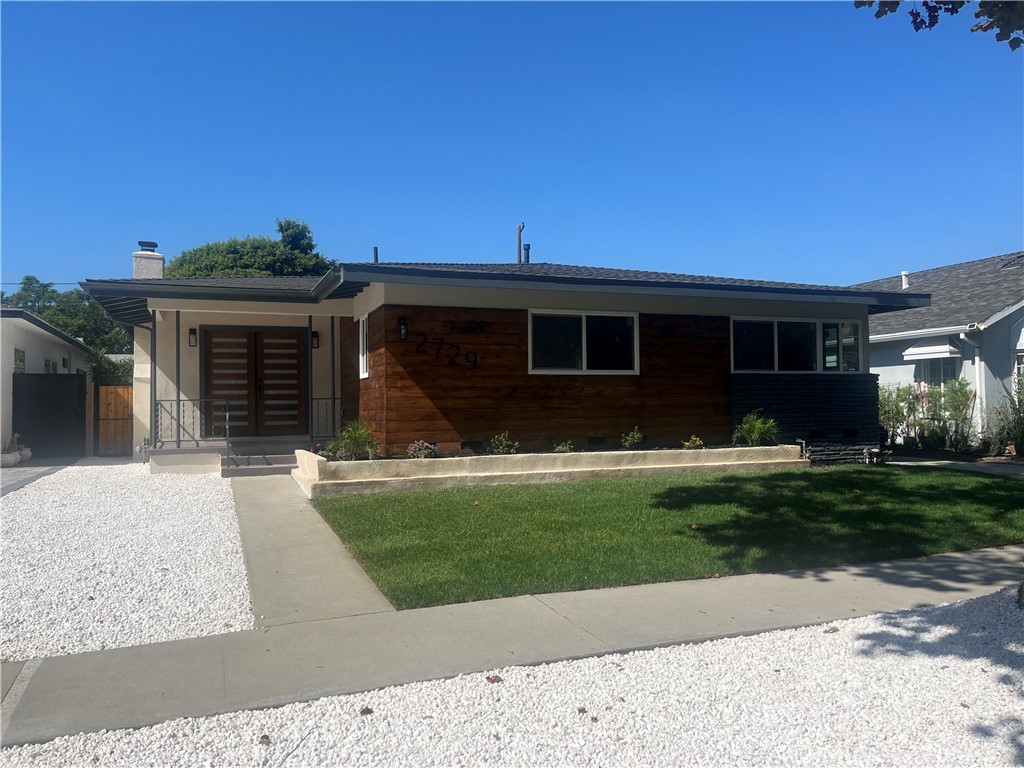 Remodeled home. Everything new from floors, doors, kitchen, bathroom tile, landscaping, roof, electrical, plumbing, etc.