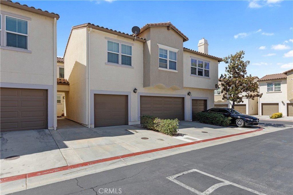 This charming 3-bedroom, 2.5-bath condo offers 1,386 sq. ft. of comfortable living in the desirable Vista Del Lago community. The first level features an bright main layout with laminate wood-style flooring, a cozy fireplace, and large windows that bring in natural light. The kitchen comes equipped with stainless steel appliances, granite counters, and ample cabinet space, flowing directly into the dining and living areas, plus laundry room. Upstairs, you'll find all bedrooms conveniently tucked away. Residents enjoy well-maintained grounds, a sparkling community pool, and a prime location with easy freeway access, shopping, dining, and parks nearby. Plus, you're just 5 minutes from the lake!