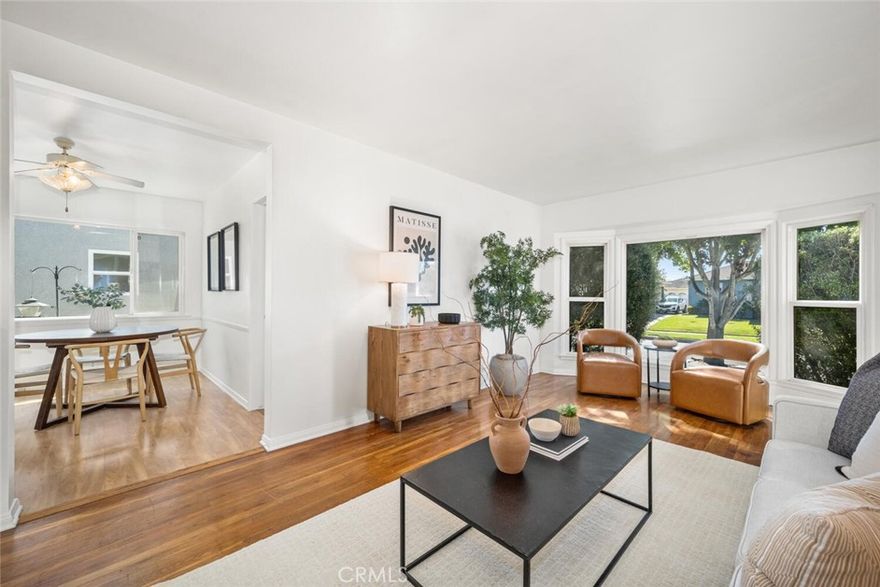 Lakewood Park Classic - First Time on the Market in nearly Fifty Years. After 46 years of family memories, thoughtful updates, and timeless charm, 6303 Tanglewood Street is ready for its next chapter. With wholesome curb appeal and the glow of original hardwood floors, this well-maintained home blends historic charm with thoughtful modern upgrades. The addition of a spacious family room, freshly carpeted (October 2025), is ideal for gatherings and cozy movie nights. Recently installed energy-efficient mini-split AC systems (2025) in the family room and two bedrooms ensure year-round comfort. The home’s interior is freshly painted, offering a clean, bright canvas ready for your personal touch. Cooking and entertaining are a breeze in the centralized kitchen space, thanks to a functional layout including a conveniently located interior laundry area just off the hallway. The home also features an upgraded electrical panel (2025), tankless water heater, and a fully replaced drain and sewage system for added peace of mind. Stepping out of the double doors onto the back patio, you’ll enjoy the privacy of your  gated driveway leading to a 2-car detached garage, ideal for parking, storage, or even a workshop. The outdoor space invites weekend barbecues, morning coffee, or peaceful evenings under the stars, waiting to be reimagined.

Location is everything, and this property delivers. Just a short stroll to Del Valle Park, home to summer concerts and community events, you’re also in close proximity to Heartwell Park & Golf Course, top-rated LBUSD schools, shopping, and easy access to major freeways for smooth commuting across Long Beach and beyond. Whether you're a first-time buyer, growing household, or someone who is just ready to write their next chapter in a beloved space, this home is a rarity. More than a home, this is a once-in-a-generation opportunity. Claim your piece of the Lakewood legacy today!