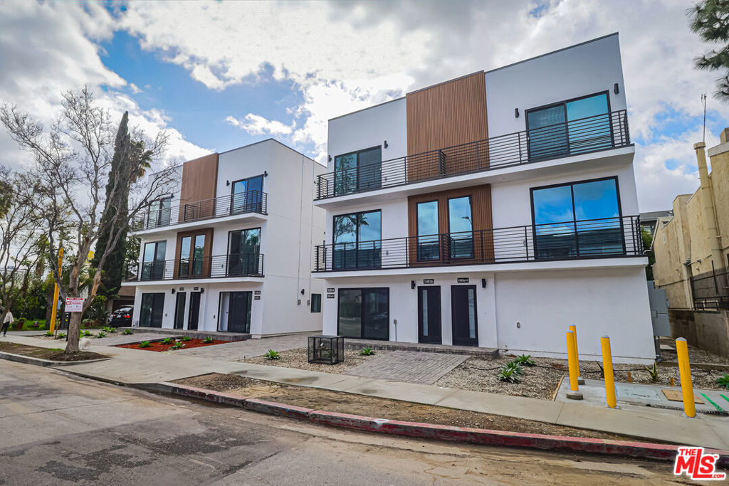 FULLY VACANT 8 UNIT COMPOUND!! Presenting 11810 Gilmore St, a brand-new, 8-unit townhouse complex offering modern design, spacious layouts, and premium finishes in the heart of North Hollywood. Situated in an Opportunity zone, this stunning new development consists of four duplex buildings with a desirable unit mix: six 4 bed/4 bath units, one 3 bed/3 bath unit, and one 5 bed/4 bath unit. Each unit features open-concept living spaces, expansive windows that bring in natural light, and private rooftop decks. The property includes parking for 14 cars, with room for an additional four vehicles. Designed for strong cash flow and minimal upkeep, this extremely low-maintenance property is projected to generate $444,720 annually ($37,060/month) with a cap rate of 5.8%. Currently 100% vacant, the property can be purchased as-is, providing flexibility for an investor to lease at market rents from day one. Located minutes from the 101 and 134 freeways, tenants enjoy convenient access to all of Los Angeles. Just around the corner, NoHo West offers premier shopping, dining, and entertainment, while the NoHo Arts District provides a vibrant cultural scene with theaters, nightlife, and boutique shops. A rare opportunity to own a high-performing, turn-key asset in one of LA's most sought-after rental markets.