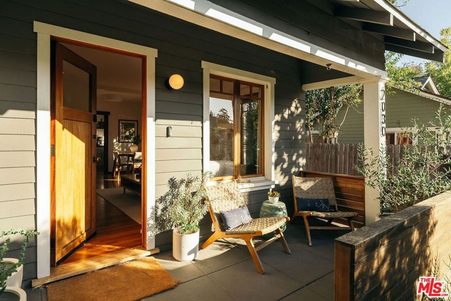 Back on market at no fault of house! Tucked away on a quiet cul-de-sac on the border of Altadena and Pasadena, 2030 Lovila Lane is a love letter to timeless design, where romantic old-world charm meets the best of modern luxury.  Past privacy trees and the classic Craftsman porch, find a living/dining space where sunlight pours through beautiful wood-framed windows onto refinished Brazilian cherry floors--golden hour glows like a painting! The kitchen has been fully reimagined with sleek tiling, new appliances, soapstone countertops, handcrafted cabinetry, and a striking custom range hood--every detail blending historic character with modern elegance. Through the hall, two bedrooms share a spacious bathroom featuring an elegant vintage clawfoot tub. This is a smart home in every sense--automated lights, locks, switches, alarms, and systems provide effortless living alongside practical luxuries such as a whole-house water softener, purified drinking taps, and a newer central AC. Outside, discover what feels like your own private secret garden: a newly built deck and lush landscaping transform the grounds into a storybook retreat, perfect for dining al fresco with friends under twinkling lights or enjoying a quiet cup of morning coffee. A spacious two-car garage sits next to a recently renovated detached studio complete with its own kitchenette and bathroom--a versatile space for working from home, enjoying creative pursuits, or entertaining guests. The home has been fully remediated after the Altadena fire--updates include all new attic insulation, all new appliances, and a brand new roof with 50-year (!) transferable warranty. Just a block away from Christmas Tree Lane and the Pasadena border, you're also moments away from great restaurants and cafes like Miya, Woon, Kismet, Homestate, Stumptown, Millie's, and more. Celebrating its 100th birthday this year, 2030 Lovila Lane has never looked more radiant: don't miss your opportunity to own a piece of history wrapped in modern-day magic--and a testament to Altadena's resilience and beauty.