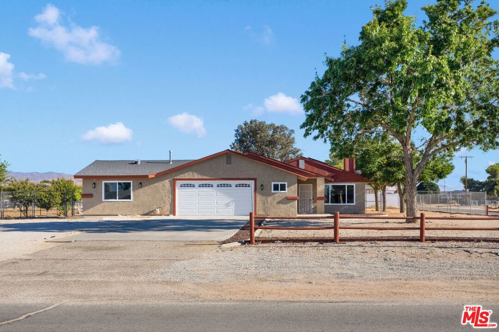 Beautifully updated 3 bed, 2 bath home on a spacious 0.46-acre corner lot in Apple Valley! Approx. 1,700 sq ft of living space with paid off solar, new vinyl flooring, fresh interior paint, recessed lighting throughout, cortez countertop, new dual-pane windows, and ceiling fans in every room for year-round comfort. Functional layout with bright, open living areas. Large garage includes bonus space perfect for a workshop or storage. Plenty of room for outdoor entertaining, or future expansion. Don't miss this move-in-ready home in a great location!