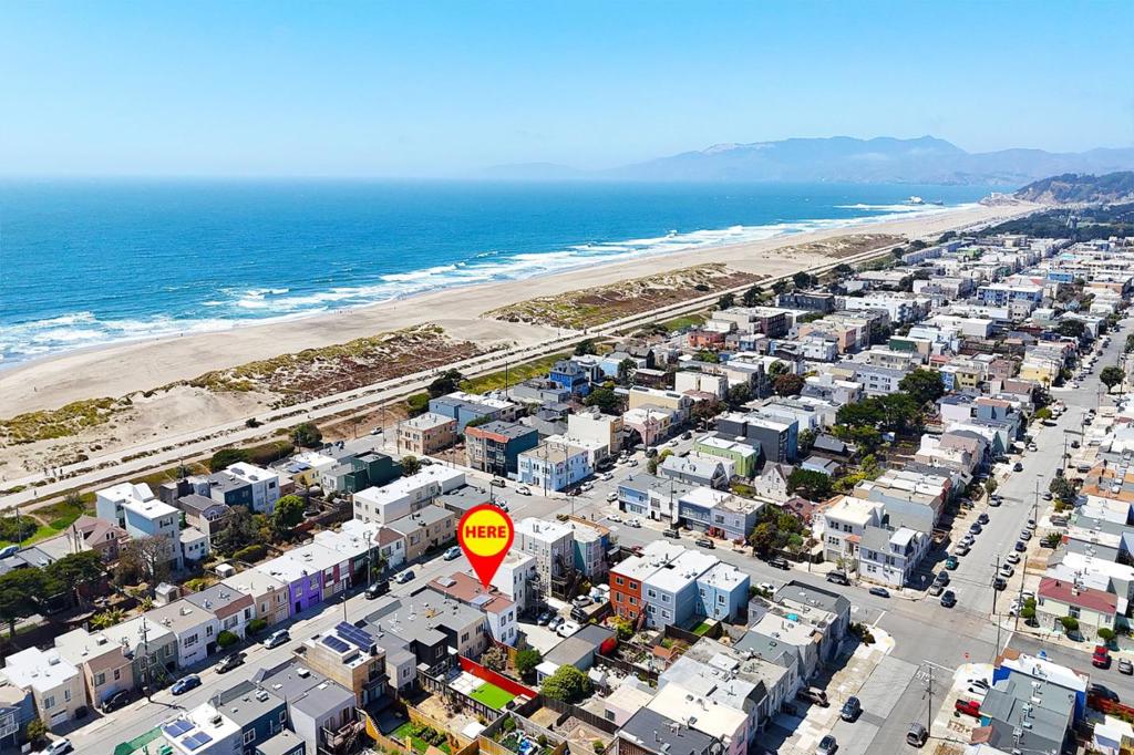 Gorgeous & Exceptional! Surfers Dream Home! Ideally located just minutes from Ocean Beach, San Francisco Zoo, Golden Gate Park, shopping, and public transit, this property offers versatility for owner-occupants and investors alike live in one unit and rent out the others for income. Don't miss this exceptional opportunity in a prime Outer Parkside location. An outstanding investment opportunity awaits with this spacious and beautifully updated property featuring 4 bedrooms, 3 bathrooms, and approximately 2,953 sq ft of living space on a 3,000 sq ft lot. The upper two flats (#1722 and #1724) each include 2 spacious bedrooms and 1 updated bathroom, bright and airy living rooms, dedicated dining areas, and newly remodeled kitchens showcasing quartz countertops, custom cabinetry, and stainless steel appliances. Unit 1722 comes with its own washer and dryer, while Unit 1724 has laundry hook-up ready. Both units have separate electric and gas meters. In basement, you find 2 rooms, 1 bath, and family room with wet bar and quartz counter, a dedicated laundry area, and generous storage space. The home also offers 3 detached garages and additional rear parking rare for the area. A must-see!