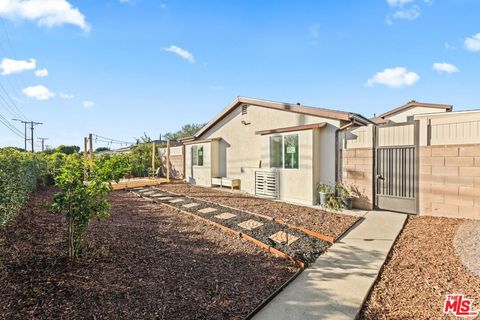 Photo of 16233 Parthenia Street, North Hills, CA 91343 (MLS # 26673135)
