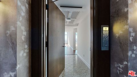 Photo of 900 W OLYMPIC Boulevard #32D, Los Angeles, CA 90015 (MLS # 25626501)