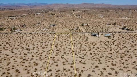 Photo of 1155 Belfield Boulevard, Landers, CA 92285 (MLS # JT25159983) Photo of 1155 Belfield Boulevard, Landers, CA 92285 (MLS # JT25159983)