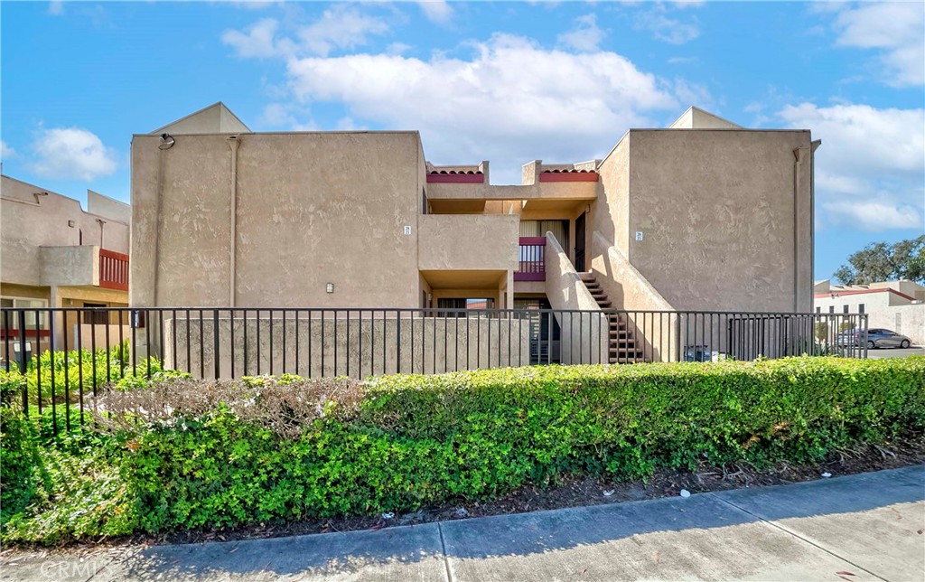 Welcome to 13100 Gilbert Street #28, a truly one of a kind upper level condo located in the highly desirable Garden Creek Villa community of Garden Grove. This beautiful residence offers two bedrooms and one and a half bathrooms with approximately 902 square feet of thoughtfully designed living space. The open floor plan features a spacious living room that flows seamlessly into the updated kitchen, which is complete with granite countertops, ample cabinetry, stainless steel stove and microwave, and a breakfast counter that connects to the dining area, making it ideal for entertaining. In addition, there is a versatile bonus den that can be used as a home office, study, or creative space. Both bedrooms are generously sized. The primary bedroom provides private access to the full bathroom, while the second bedroom offers abundant closet space. The oversized bathroom includes a shower over tub along with a separate guest half bathroom. Additional highlights include an indoor laundry closet for convenience, a two car detached garage located near the unit, and plentiful guest parking. The community offers resort style amenities including a sparkling pool and spa, a tranquil pond, lush landscaped grounds, and secure gated access. The monthly association dues cover trash service and exterior insurance. This exceptional home is centrally located near schools, shopping, dining, entertainment, and provides easy access to the 22 freeway. It combines peaceful living with prime convenience. Do not miss your opportunity to own this special property in one of Garden Grove’s most sought after communities. Schedule your private showing today.