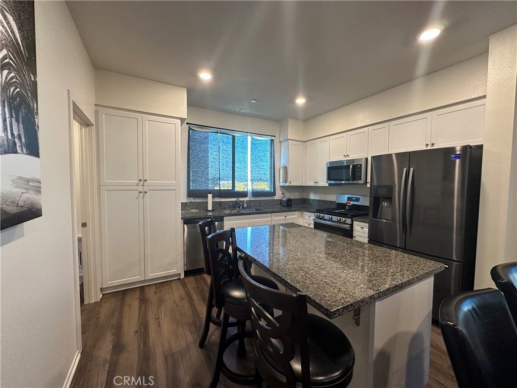 Photo of 17612 Garden House Lane, Bellflower, CA 90706 (MLS # OC25245424)
