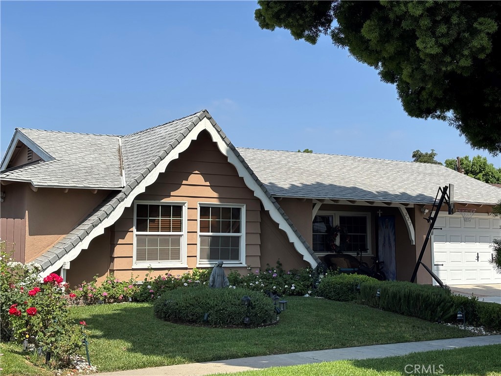 Fully Furnished Lease in Anaheim! This spacious and beautifully maintained home is offered fully furnished and move-in ready, featuring 4 bedrooms and 3 bathrooms. The open floor plan includes a large kitchen with ample counter space that opens to an expansive living room with a cozy fireplace and a formal dining area—ideal for entertaining and everyday comfort. The generous backyard is a private retreat with a sparkling pool, spa, built-in BBQ, covered patio, and a variety of lavish trees. Additional highlights include an attached 2-car garage and a wide driveway providing extra parking. Situated directly across from Maxwell Park and near the Anaheim Public Library, shopping, dining, and schools. A rare opportunity to enjoy California living in a beautifully furnished home!