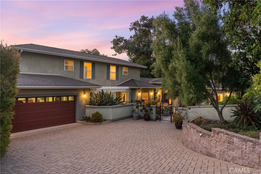 Welcome to Grovehill Hideaway, a beautifully appointed 4-bedroom, 3-bathroom home offering 2,692 sq ft of living space in the highly desirable Banana Hill neighborhood. Perfectly located just minutes from downtown San Luis Obispo, this residence blends peaceful surroundings with everyday convenience.



From the moment you arrive, the wide driveway and gated front patio create a warm welcome and provide space to relax outdoors or host friends. Inside, natural light pours through expansive windows, highlighting the home’s open, airy design. The sunken living room—with its corner windows and cozy fireplace—sets the stage for both lively gatherings and quiet evenings.



The bright kitchen features timeless white cabinetry, recessed lighting, and a large picture window overlooking the backyard. A private primary suite offers direct patio access along with a dual vanity, walk-in shower, and soaking tub—your own retreat within the home. Three additional bedrooms provide flexible space for family, guests, or a home office.



A dedicated laundry room with storage and utility sink adds convenience, while the backyard offers a serene, low-maintenance escape with pathways, mature landscaping, and plenty of room for outdoor entertaining. Whether you’re enjoying your morning coffee on the patio or hosting weekend barbecues, the property provides a perfect balance of comfort and lifestyle.



Don’t miss this rare opportunity to own in one of San Luis Obispo’s most sought-after neighborhoods—where charm, convenience, and location come together.