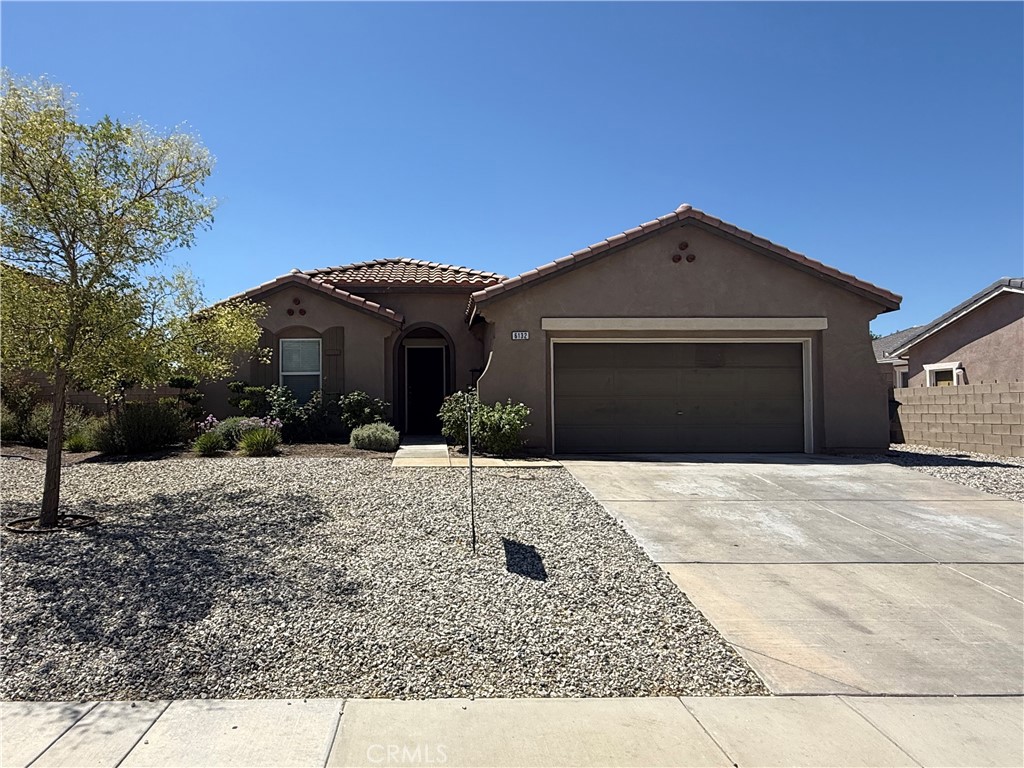 Clean and Move-in Ready! Large Newer 3 BR near Park, Schools and Shopping! Single Story. 1739 SF. Built in 2008. 2-Car Garage. Roll-up Door. Tile Roof. Stucco Exterior. Wood Trim. Front Xeroscape. Covered Front Porch. Brand New Carpet. LR/DR Combo. Recessed Lighting. Very Nice Open Kitchen! Breakfast Bar. Family Room. Split Floor Plan! Backyard has Round Cement Table and Chairs. Block Walls. Better Hurry on This One!