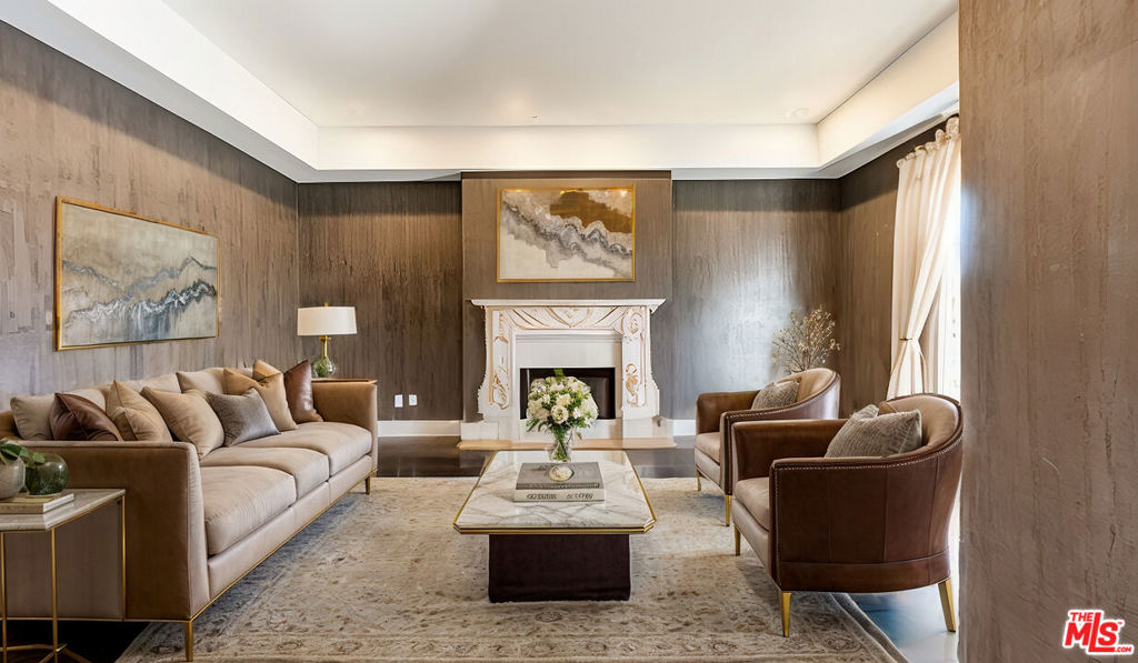 Welcome to this exquisite 5-bedroom, 4.5-bath Mediterranean retreat, built in 2008 and perfectly nestled in the heart of Beverly Hills within the prestigious Beverly Hills Unified School District. This stunning residence combines timeless elegance with modern comfort, offering an unmatched lifestyle of luxury. Enter through the grand foyer with soaring ceilings, leading to an expansive living space bathed in natural light. The gourmet chef's kitchen boasts top-of-the-line appliances, custom cabinetry, and a spacious island, ideal for entertaining.The primary suite serves as a serene escape, complete with dual walk-in closets, a spa-inspired bath, and a private balcony. The home also features three additional ensuite bedrooms, ensuring comfort and privacy for all.Step outside to enjoy the private pool and spa, as well as a functional outdoor area perfect for gatherings or relaxation. The property also includes a 3-car carport, adding convenience and practicality.Situated just moments from world-class dining, shopping, and entertainment, and offering access to top-tier schools within the Beverly Hills School District, this property is truly a masterpiece of sophistication and style. Experience Beverly Hills living at its finest! Schedule your tour today!