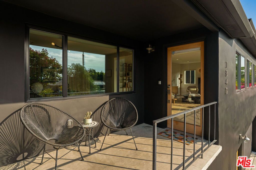 Photo of 1840 S Dunsmuir Avenue, Los Angeles, CA 90019 (MLS # 25593711)