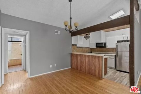 Photo of 18433 Hatteras Street #207, Tarzana, CA 91356 (MLS # 26723687)