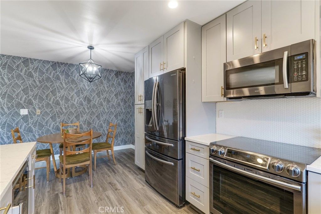 Photo of 5232 Corteen pl Pl #17, Valley Village, CA 91607 (MLS # SR26081709)
