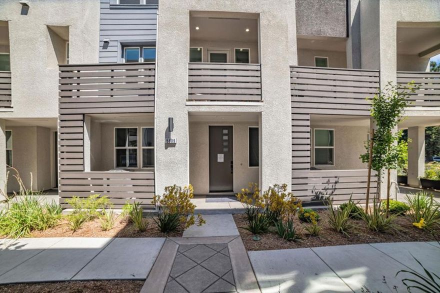 Towns Plan 3, available for quick move-in, includes 4 bedrooms, 3.5 bathrooms, a 2-car side-by-side garage, quartz kitchen countertops, Bosch appliances, and shaker-style paint-grade soft-close cabinets. The first floor offers a bedroom with an en-suite bath, perfect for guests or office space. The second level features the main living area with a spacious living and dining room ideal for entertaining, along with a deck to relax and enjoy fresh air. The primary bedroom provides a large walk-in closet. Energy efficiency is enhanced with solar panels that can be leased or owned. City Village by SummerHill Homes features 404 elegant residences and a 2-acre public park with walking and biking trails, seating areas, and a community barbecue space. Located near San Ramons City Walk Neighborhood and within walking distance of City Centers restaurants, movie theater, and shops, the community offers easy access to a variety of amenities. Designed for convenience to schools, work, and public transit, with nearby attractions including Central Park, Canyon Lakes Golf Course, and Bridges Golf Club. The images shown depict another home; actual finishes will vary.