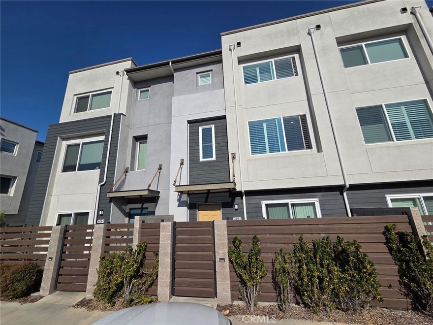 Don't miss your chance to own the largest floorplan of the Newfield Community, with a premium lot location! Built in 2017, this fully upgraded 3 bedroom, 3.5 bath unit has water-proof vinyl plank flooring throughout, custom wood plantation shutters over dual pane windows, ! Highly sought after South facing central location. The spacious kitchen includes custom tile backsplash, quartz countertops, ample storage space, Peninsula Island, and walk-in pantry. Large master bedroom includes an En-Suite bathroom with double sinks upgraded countertop, and a huge walk-in-closet. 3rd Bedroom includes En-Suite Bathroom. Perfect for entertaining family & friends or spending quiet evenings at home. 2 car side-by-side private garage. Ideally located with close proximity to SpaceX, Honda, and Northrup Grumman, and a short 15 minute drive to the heart of downtown, and has easy access to the 110, 105, 405 and 91. 10 yr transferable builder warranty is included. Solar and Electric car chargeport ready.