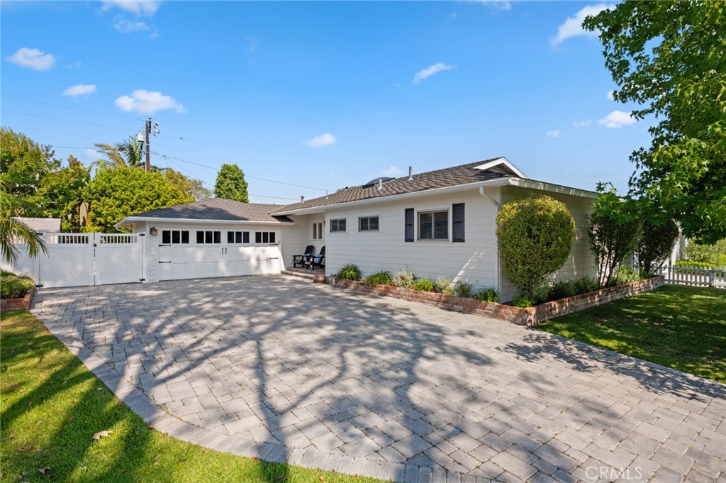 Welcome to this stunning single-story home located in a highly sought-after neighborhood in Newport Beach. This beautifully maintained, freshly painted residence offers three spacious bedrooms and two full bathrooms, providing ample space for comfortable living. Inside, you’ll find warm vinyl plank flooring throughout and elegant, recessed lighting. The cozy living room features a fireplace and opens through French doors to the beautifully landscaped backyard. The kitchen is both functional and stylish with stainless steel appliances, a refrigerator with ice maker, and white shaker cabinets. Each bedroom includes mirrored closet doors, offering clean lines and modern convenience. The home also features washer and dryer hook-ups, as well as an attached two-car garage complete with custom storage cabinets and durable epoxy-coated flooring. Outside, the expansive backyard is perfect for entertaining, featuring a built-in BBQ and multiple seating areas to enjoy sunny days or quiet mornings. Located within the highly regarded Mariners Elementary School district and just minutes from 17th Street, John Wayne Airport, famous beaches, and the shopping and dining of Fashion Island—this home combines timeless style with unbeatable convenience.