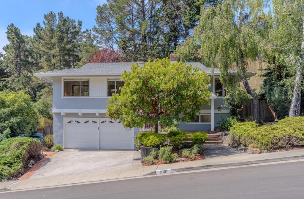 Welcome to 1031 Yosemite Drive, a spacious and versatile home located in Park Pacifica, the neighborhood known for having the sunniest and most desirable weather in town. The main level features three bedrooms and two bathrooms, along with a bright living room with a fireplace, an open dining area, and an eat-in kitchen with plenty of storage and counter space.Downstairs offers a large family room perfect for gatherings, entertaining, or movie nights, as well as a fourth bedroom that can be used as a guest room, home office, or space for extended family. The layout is ideal for those who want flexibility and room to grow, with direct access to the backyard creating a seamless indoor-outdoor flow.The property also includes a private backyard, an attached garage, and driveway parking. Located just minutes from San Pedro Valley Park, Pacificas beaches, schools, shopping, and dining, this home offers both comfort and convenience. Easy access to Highway 1 makes commuting to San Francisco or Silicon Valley a breeze.