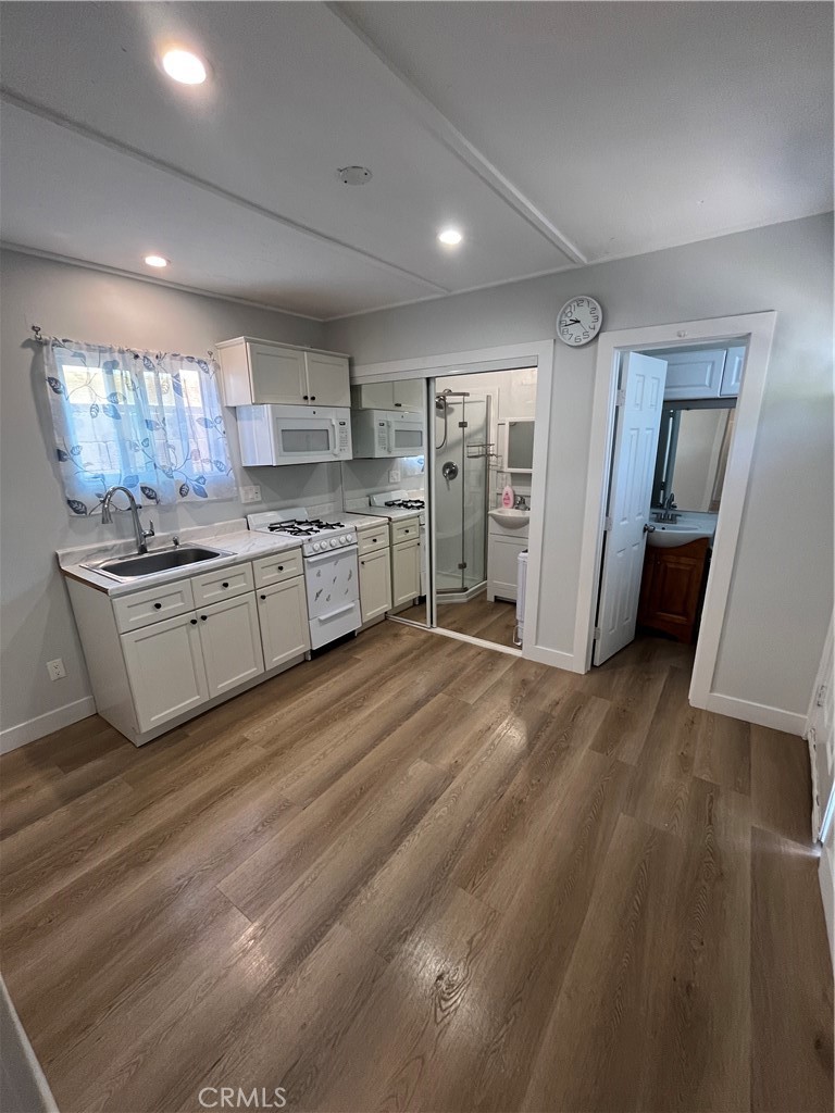 New construction 24407 1/2 Alliene Ave. Lomita, 1 bed/1 bath freestanding unit/ADU's privet area, including AC/Heating MiniSplit, New Vinyl flooring, Kitchen, stove/Range included. Separate Utilities, Gas, Electricity, TV. only water is sharing and shall be paid by tenants.