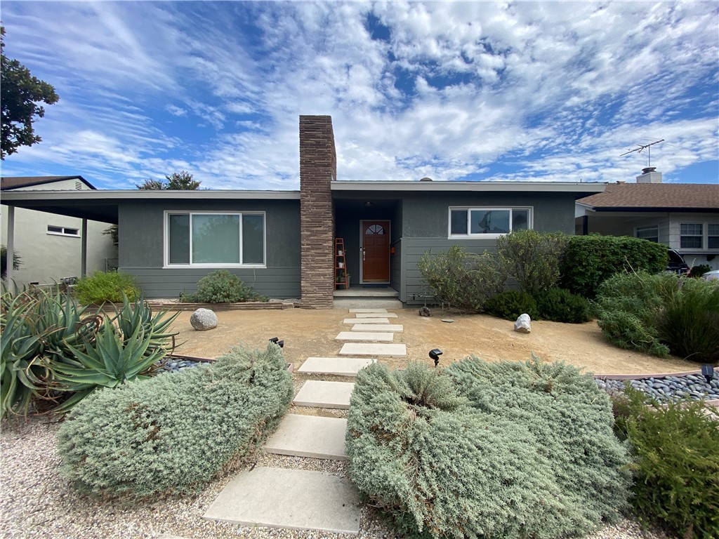 Midcentury Modern Home in Prime Tarzana Location - 3 Bedrooms - 2 Baths - Bonus Room - Pool. This stylishly updated midcentury modern home blends classic charm with contemporary comfort. Located in a central Tarzana neighborhood near freeways and shopping, it features open yet defined living areas with hardwood floors, abundant natural light, and pool. The chef’s kitchen boasts modern cabinetry, quartz countertops, LG stainless appliances, and ample prep and seating space—ideal for casual entertaining. The spacious primary suite includes a private bath, while secondary bedrooms offer generous closets. Bathrooms are tastefully renovated with midcentury-inspired details. Enjoy the versatile Bonus Room/Office (included in square feet)—perfect as a 4th bedroom, guest room, gym, or playroom. The large yard features a sparkling pool, patio lounge area, and room to entertain or relax under the stars. Additional features: solar panels, A/C, in-unit laundry. Rental Info: Call to schedule a showing. All information provided must be verifiable. Good credit is required for all applicants. No co-signers and no subleasing permitted. Pets allowed with prior approval. Online applications are not accepted — you must view the property in person before submitting an application.