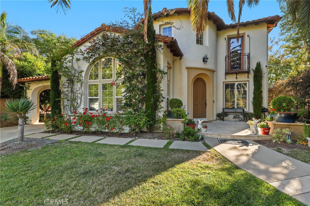 Welcome to an extraordinary opportunity to live in a stunning, private, ocean-view estate tucked away in a secluded cul-de-sac within a prestigious gated enclave. This Spanish Revival masterpiece is set on an expansive, flat lot of over 12,000 square feet—boasting one of the most impressive backyards in all of South Orange County. A true resort-style retreat, this residence offers the ultimate in privacy, sophistication, and coastal living.
From the moment you arrive, a custom wrought-iron motorized gate opens to reveal an extended private driveway with ample space to accommodate over seven vehicles. Inside, this 5-bedroom, 4-bathroom estate also includes a dedicated office, blending elegant design with modern functionality.
Soak in mesmerizing ocean views and unforgettable sunsets from both the main level and the expansive primary suite—complete with a cozy sitting area and an oversized custom walk-in closet. The open-concept family room features a refined fireplace and bespoke built-in media cabinetry, seamlessly flowing into the designer kitchen. A chef’s dream, the kitchen is outfitted with all Viking appliances, a Sub-Zero refrigerator, striking quartz countertops, and timeless subway tile backsplash. The crown jewel of this estate is the outdoor oasis: a lush, professionally landscaped haven highlighted by mature olive trees, vibrant rose gardens, and a bounty of fruit trees. The meticulously designed backyard offers unparalleled amenities including a sparkling resort-style pool, glass tile infinity-edge spa, baja shelf, fire bowls, fire pit, and putting green. Entertain in style with a state-of-the-art outdoor kitchen featuring a built-in BBQ grill, refrigerator, cooktop, sink, and premium surround sound system—all enveloped in complete privacy. A spacious grassy side yard provides additional space for play or relaxation, separate from the main entertainment areas. Additional features include a tankless water heater, proximity to award-winning schools, scenic hiking trails, and the notable absence of Mello-Roos taxes. This home is more than just a residence—it’s a private coastal resort you’ll never want to leave.