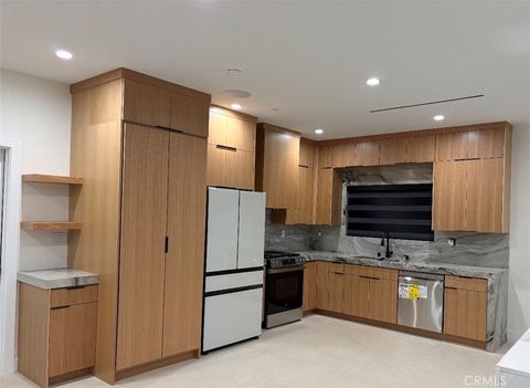 Photo of 417 W franklin Ave, Pomona, CA 91766 (MLS # DW26071668)