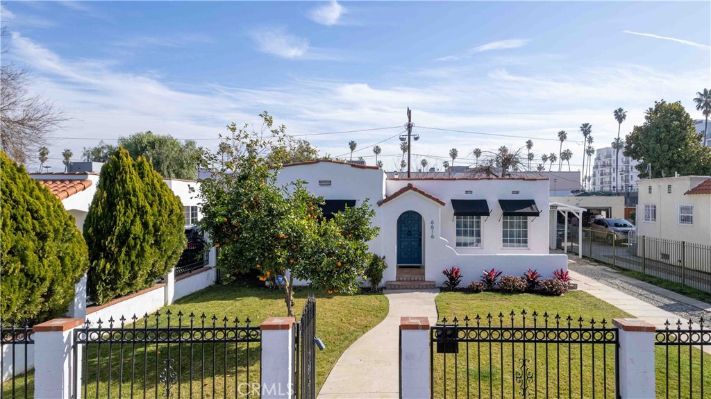 FOR LEASE. 2 Units. House and ADU. Welcome to 6616 & 6614 Vesper Ave, an exquisite Spanish-style multi-unit property nestled in the historic district of Van Nuys. Thoughtfully restored with modern Old-World Spanish charm, this unique 2 unit property of 4 bedrooms, 3 bathrooms, and approximately 1,651 sq ft of combined living space — ideal for multi-generational living, investment, or income potential.
Step inside the front main residence 6616 Vesper Ave (1,301 sq ft) and be greeted by arched entryways, fully remodeled bathrooms, kitchen, and exterior wrought-iron accents, accenting the home’s Spanish heritage. The open-concept living room is flooded with natural light.
The updated kitchen seamlessly blends modern Spanish charm with functionality, featuring handcrafted-style tile backsplash, sleek countertops, open shelving, and brand-new stainless-steel appliances — perfect for both everyday living and entertainment.
Detached from the main home is 6614 Vesper Ave, permitted 350 sq ft ADU, echoing the same Spanish flair and its own private entrance — perfect for guests, extended family, or rental income.
Outside, the long gated driveway accommodates multiple vehicles or even an RV, leading to a charming covered carport. The fully fenced property offers both privacy and curb appeal.
A perfect blend of historic Spanish elegance and modern upgrades, this property is a rare gem—offering two homes for the price of one.
Move-in ready and available for a fast closing — don’t miss this one-of-a-kind opportunity! BOTH UNITS ARE NOT FURNISHED