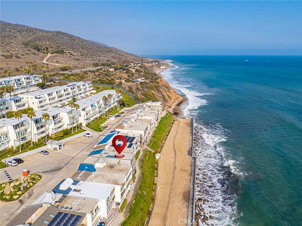 Photo of 11892 Beach Club Way, Malibu, CA 90265 (MLS # CV25184060)