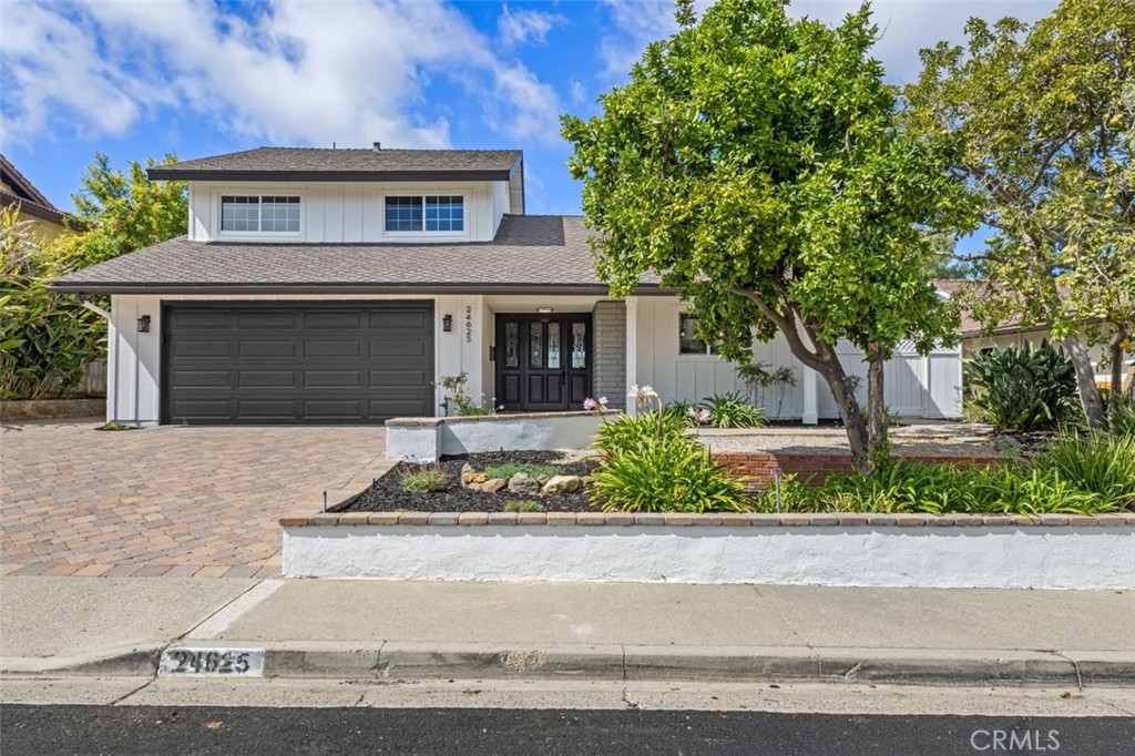 A Rare Opportunity in the Highly Sought After “Pacesetters” community. Set on an expansive 11,000 sq ft lot with stunning mountain and city light VIEWS, this beautifully remodeled 4 bedroom home with a large bonus room offers the perfect blend of modern upgrades, timeless comfort, and limitless potential. Rarely do homes in this popular neighborhood, where lots are oversized, views are breathtaking, and options abound come available at this price. The ground floor primary suite is a true retreat, opening to the lush backyard through French doors for seamless indoor outdoor living. The fully permitted kitchen remodel features designer finishes including custom soft-close cabinetry, pull-out pantry shelves, a tile backsplash that extends to the ceiling, new appliances, modern lighting, an oversized breakfast bar, and raised ceilings with recessed lighting for an open, airy feel. The spacious dining and family rooms showcase a stacked stone fireplace, wood mantle, and large windows that frame the views. Every detail has been thoughtfully updated: luxury vinyl plank flooring, fresh designer paint, new baseboards, remodeled bathrooms with quartz counters and frameless glass shower doors, copper repiping, a 200 amp panel, new fixtures, doors, fencing, and more. Outdoors, the home is surrounded by beautifully designed pavers, planters, mature landscaping, and a collection of fruit trees including apple, grapefruit, limes, kumquat, tangelo, navel and blood orange, Meyer lemon, custard apple, mandarin orange, and pomegranate. With space for an ADU, RV or boat parking, and expansion, the possibilities are endless. Add in the privacy of no HOA, a large driveway for three cars plus a two car garage, and extensive upgrades throughout, and you’ll see why this property is a rare find. This home is more than move in ready, it’s priced to sell and ready to become your forever home in one of the area’s most desirable neighborhoods.
