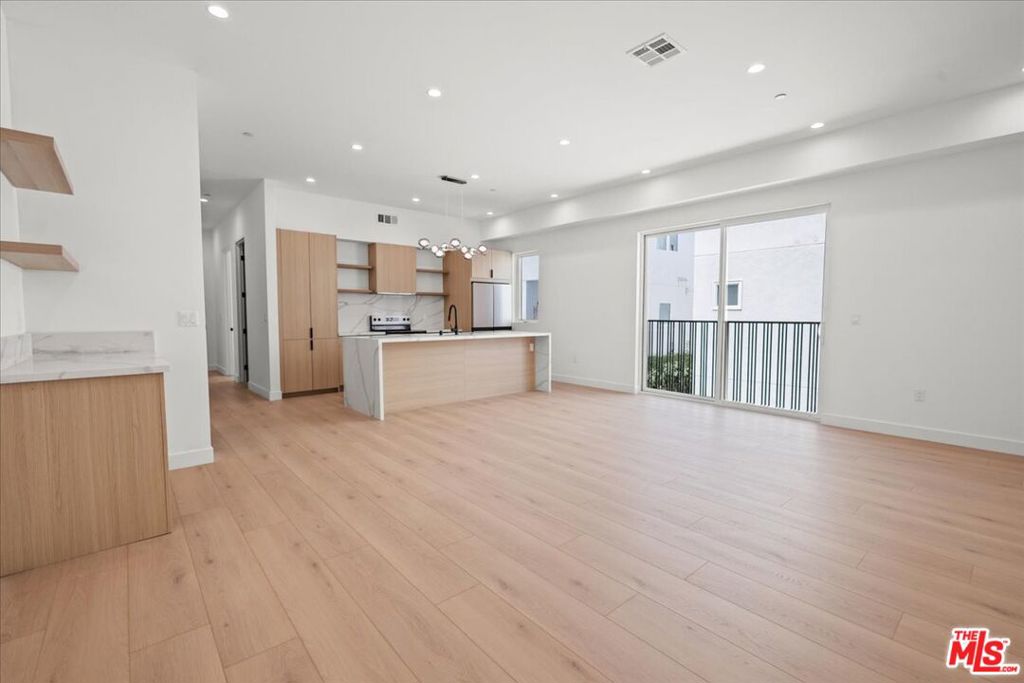 ** BRAND NEW ** PET FRIENDLY ** WASHER/DRYER ** CENTRAL A/C ** 2-CAR SIDE-BY-SIDE GARAGE ** LARGE BEDROOMS ** LARGE LIVING ROOMS ** Discover the perfect blend of luxury and lifestyle at this brand-new modern residence in the heart of North Hollywood. From the moment you step inside, you'll be welcomed by dramatic high ceilings, abundant natural light, and expansive living spaces designed for comfort and style. The gourmet kitchen is a true showstopper, featuring a sleek island, modern cabinetry, and premium finishes that make both cooking and entertaining a joy. The extra-large bedrooms offer a private retreat, while thoughtfully designed outdoor spaces invite you to relax, unwind, or enjoy evenings under the California sky. This home comes complete with everything you need for easy modern living: a private side-by-side 2-car garage, in-unit washer & dryer, and central AC & heat for year-round comfort. It's also pet-friendly, so your furry companions can feel right at home, too. Beyond your doorstep, you'll love being in one of LA's most dynamic neighborhoods. North Hollywood is buzzing with energy from the arts district and boutique shops to trendy cafes, restaurants, and nightlife. There's always something to explore. Convenient access to major freeways and the Metro makes commuting across the city a breeze, while local parks and studios bring a perfect mix of work and play right to your neighborhood. If you're searching for a spacious, stylish, and centrally located home that checks every box, look no further. 5216 Satsuma Ave is truly an amazing find.