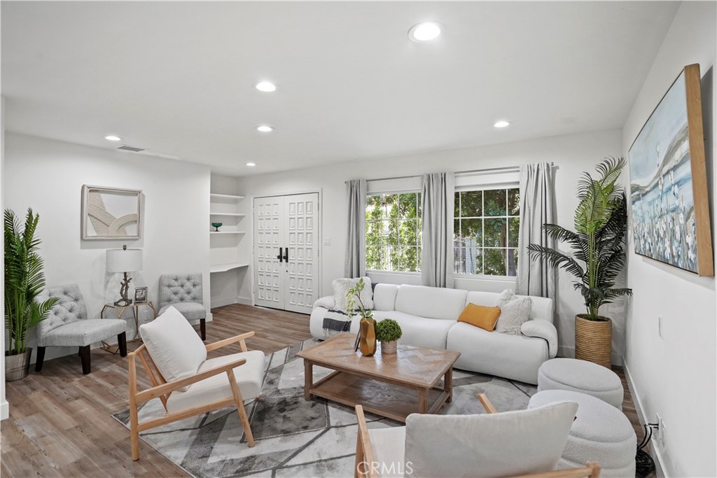 $50,0000 PRICE REDUCTION!!! Totally Remodeled Gated Gem in Valley Glen – Just One Block from Sherman Oaks!!! Welcome to this Truly Delightful Residence with Charming Curb Appeal, nestled behind the Iron Gate that opens into a Huge Courtyard with lush Artificial Grass. Situated on an 8,009 Sq. Ft. Lot, this Beauty features around 1,500 Sq. Ft. of Living Space, 3 BD and 2 Remodeled BA. Step inside to discover a Spacious Living and Dining Area filled with Charm and enhanced by Laminate Floorings, Recessed Lighting, French Window and a Sliding Doors. The thoughtfully designed floor plan places 2 BD and 1 BA on one side of the home, and 1 BD and 1 BA located privately on the other—ideal for guests, or extended family, or rental quarters. The Chief's Kitchen offers ample Cabinetry, Brand New Quartz Counters and Flooring; Space for a Breakfast Area and a Laundry area tucked in the corner—perfect for busy households. The Spacious Master Bedroom boasts a large Walk-in Closet and a Private Sitting Area—perfect for relaxing in your own personal retreat. Two additional generously sized Bedrooms offer plenty of comfort and privacy. Recent upgrades include BRAND NEW: Interior and Exterior Paint; Beautiful Laminate Floorings throughout; 2 New BA; AC Condenser & Evaporator Coil; Refinished Cabinets, Counters and Flooring in the Kitchen; Sewer Line; Artificial Grass in the Courtyard and the Backyard!!! There are a NEWER Double-pane Windows and Sliders; around 8 years old Roof; PAID OFF SOLAR PANELS!!! But that’s not all… A Detached, fully Drywalled and Painted Garage offers endless possibilities: use it as a home office, Daycare Setup, Studio, or convert it to an ADU—let your imagination take over! The Huge Backyard features a Covered Patio, a Large Flat Yard with room for a Pool or to build a Second ADU with its own private entrance!!! Whether you're looking to expand, build up, or just enjoy this Fully Remodeled Home for entertaining, the opportunities are endless. Located across the street from Sherman Oaks, minutes away from Galleria, Shopping, Fine Dining and 101 FWY!!!