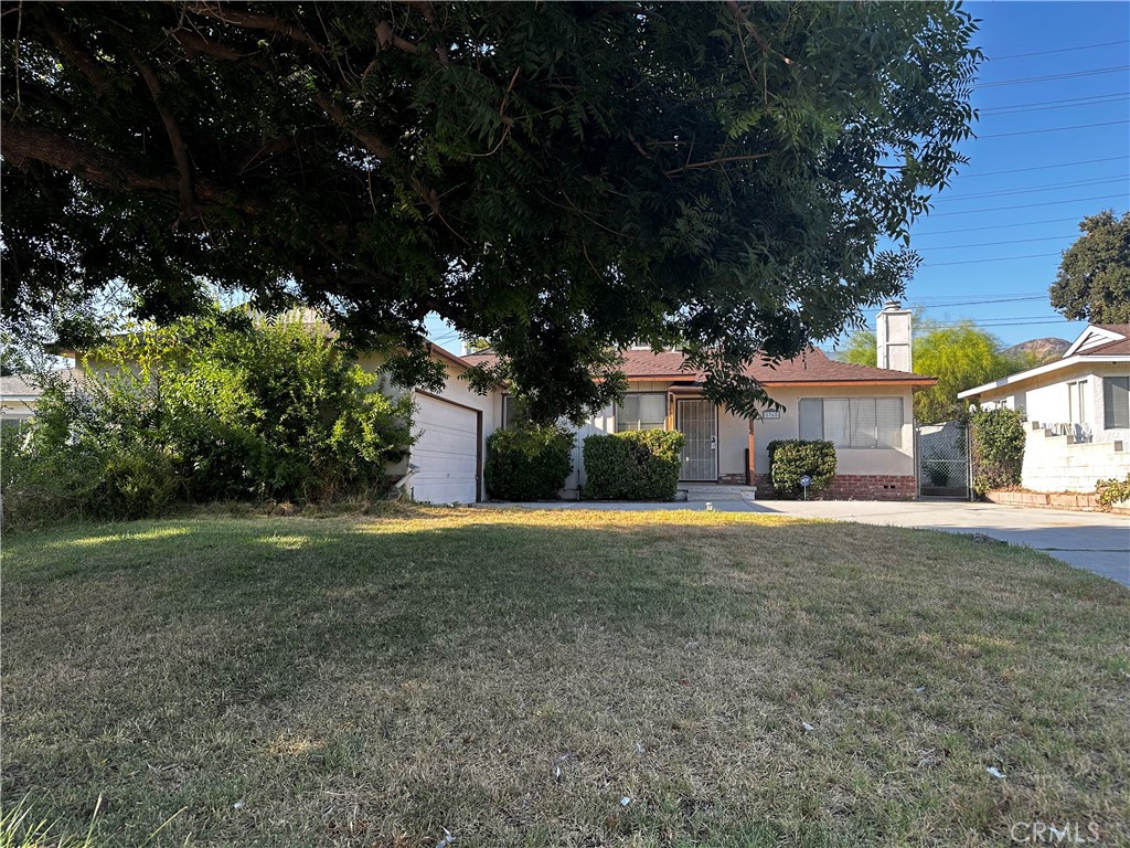Discover the possibilities with this 3-bedroom, 1.5-bathroom home offering 1,071 sq. ft. of living space on a spacious lot in San Bernardino. Built in 1955, this single-story residence features a welcoming living room, a breakfast nook dining area, and a family room, providing multiple spaces to gather and enjoy. The property also includes a 2-car garage for convenience and storage. While the home is in need of cosmetic repairs, it presents a fantastic opportunity for investors seeking their project or for a homebuyer with vision and handy skills to transform it into their dream home. With its classic layout and location, this property is a blank canvas ready for renovation and new beginnings. Don’t miss your chance to unlock the potential!