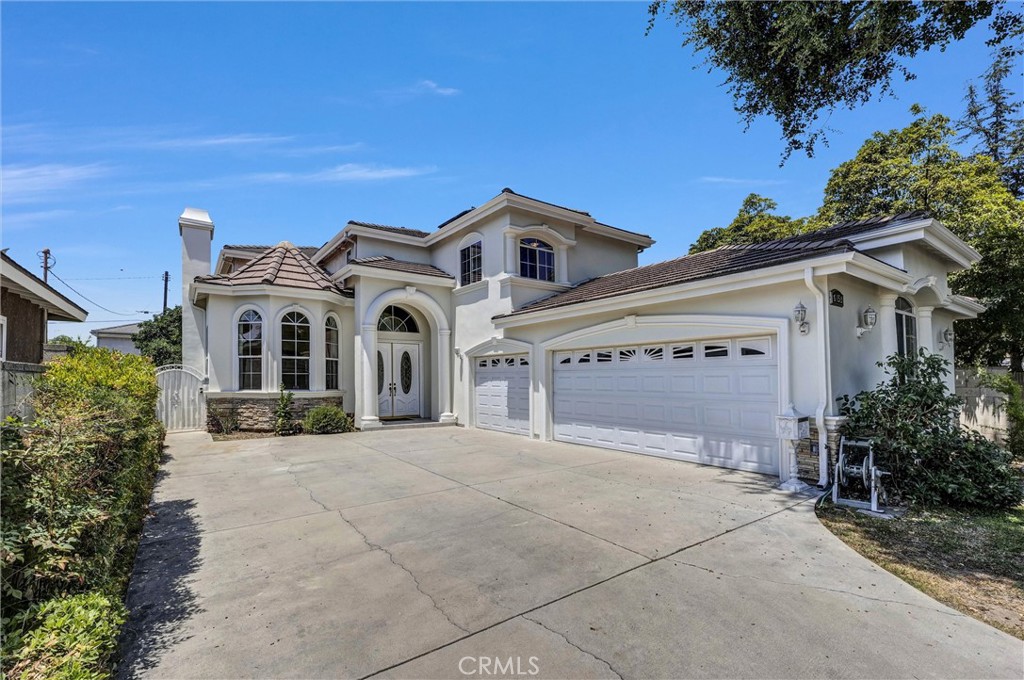 Beautiful 2-story home located in heart of Temple City features 4 bedrooms and 4.5 bathrooms. It boasts a separate eating area that opens to the family room with build in bar and a cozy tile fireplace. It also has a formal living room and dining area as well as a downstairs bedroom . Master bedroom has a double-sink vanity, Jacuzzi tub, separate shower, and a closet. It has a 3 car attached garage, solar panels has been paid off fully landscaped front yard, and an easy maintenance backyard with fruit trees perfect for family get togethers. This charming home is located in the highly award wining Temple City Unified School District and located in an extremely convenient and quiet cul-de-sac neighborhood with tons of shopping plazas, restaurants, schools, transportation, easy access to 10 and 210 Freeways.