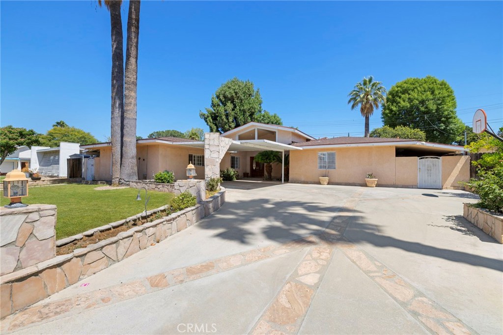 Nestled on a cul-de-sac in the heart of Porter Ranch, this unique home offers endless possibilities. Featuring 3 bedrooms and 2 bathrooms, the residence includes a generous primary suite complete with an en-suite bathroom and three closets for ample storage. A large bonus room provides flexible space perfect for entertaining, dining, or unwinding, while a charming indoor/outdoor room with air conditioning adds comfort and functionality year-round. Step outside to a private backyard retreat with a sparkling pool and a covered patio ideal for summer gatherings. Upgrades include ceiling fans, dual-pane windows, and recessed lights. Located within a highly rated school district, this home blends comfort, character, and potential in one of the valley’s most sought-after neighborhoods. Bonus room could be converted to ADU for rental income.