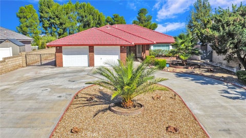 Photo of 13355 Stoneridge Drive, Victorville, CA 92395 (MLS # HD26213465)