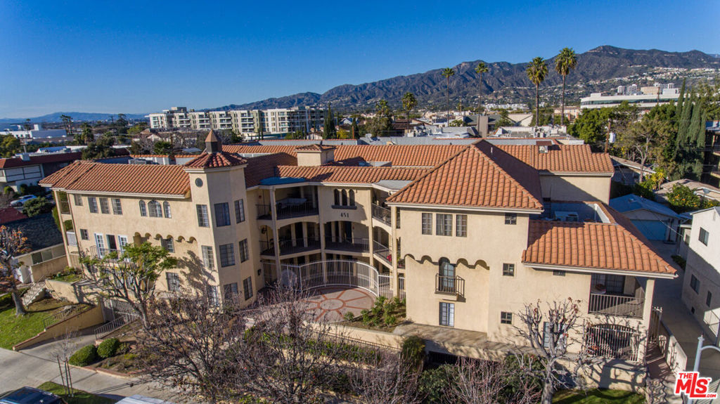 We are pleased to present an exceptional investment opportunity: 451 Hawthorne St, a 25-unit multifamily property located in the Moorpark neighborhood, just steps away from Downtown Glendale. This property, offered for sale for the first time in 33 years, represents a rare generational investment in the highly sought-after Downtown Glendale area, situated only one block from the Glendale Galleria and two blocks from the Americana on Brand.What sets 451 Hawthorne apart from other properties of similar vintage in Glendale is its distinctive architecture and layout, making it an ideal choice for investors seeking over 20% in rental upside through an interior and exterior renovation program. The property's value is further solidified by its zoning designation as R1250, which prohibits future multifamily developments of this size at this prime location.Constructed in 1989, this three-story property comprises six 1-bedroom/1-bathroom units, one 1-bedroom/1.5-bathroom + office townhouse unit, and eighteen 2-bedroom/2-bathroom units. Nine of these units have undergone renovations featuring custom kitchen cabinetry and updated bathrooms, while almost all units have received new vinyl plank or wood laminate flooring. Four units have undergone minor improvements, and the remaining 12 units have been well-maintained but not renovated. Many units feature private patios, common area patios, private balconies, and Juliette balconies. The average unit size is approximately 950 square feet, offering diverse floorplans suitable for family living. All units are equipped with central HVAC and are individually metered for gas and electric utilities.The property includes a subterranean garage providing 48 parking spaces for tenants, an owner's storage room, trash disposal area, an on-site laundry room, and elevator access. Recent capital expenditures have ensured the property's excellent condition, including a new sewer line, elastomeric roof coating, and the installation of 6 new HVAC package units. The remaining 19 HVAC package units are under contract to be replaced soon. 451 Hawthorne St. is conveniently situated between Broadway and Colorado St., with Central Ave. to the west and Pacific Ave. to the east. Residents have easy access to several nearby bus stops on Pacific Ave., Broadway, and Colorado St. Moreover, its proximity to the Glendale Galleria and Americana at Brand, both within one to two blocks, ensures a high demand for rental units in one of Glendale's most sought-after neighborhoods.