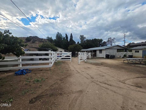 Photo of 9735 Wheatland Avenue, Los Angeles, CA 91040 (MLS # P1-29396)