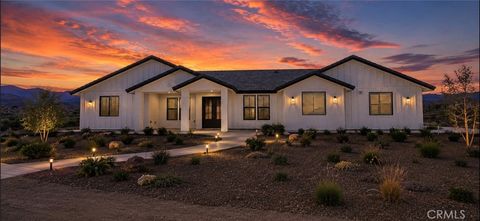 Photo of 6224 Outpost RD, Oak Hills, CA 92344 (MLS # IV26096390)