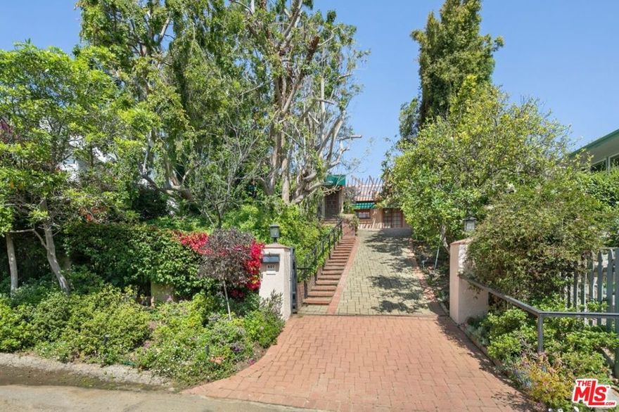 Bring your imagination or designer. This beautiful setting offers endless possibilities to remodel, expand, or build your dream home. Discreetly hidden behind gates, this charming 2-bedroom home in the heart of Pacific Palisades blends endless possibilities. Situated on a quiet, tree-lined street, the property features 2 spacious bedrooms, each with a walk-in closet and a full en-suite bathroom, providing comfort and privacy. As you enter, you will be greeted by open-concept living and dining areas that are filled with natural light and designed for modern living. Don't miss the opportunity to transform this exceptional property in one of Los Angeles' most desirable neighborhoods.