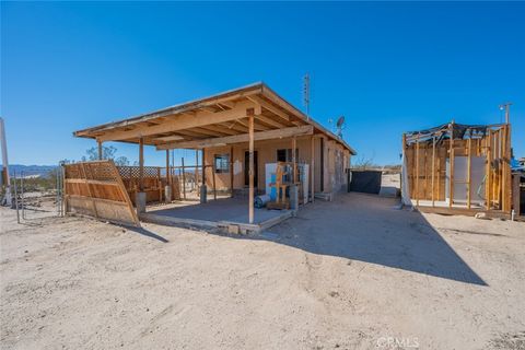 Photo of 67722 Pole Line Road, 29 Palms, CA 92277 (MLS # JT26066451)