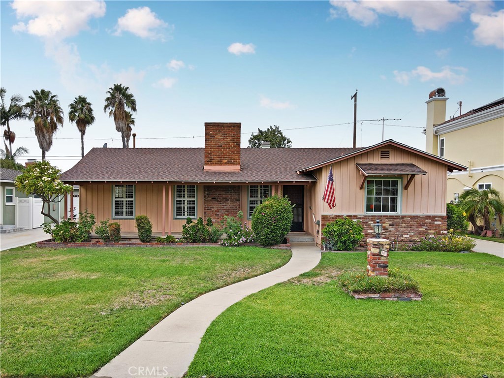 Great Downey location! Mid-Century Ranch home with 3 bedrooms and 3 bathrooms. Large living room with fireplace and dining area. Updated kitchen with granite countertops and custom cabinetry opens to a SPACIOUS den with window seat overlooking the backyard. Large Primary Suite with dressing area, large closets and bathroom with dual sinks. Convenient inside laundry. Detached garage with long driveway. Close to schools and shopping.