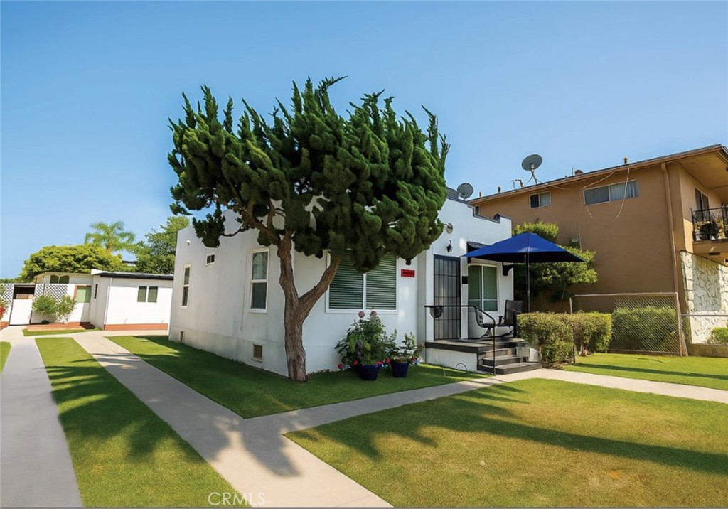 Located in Long Beach’s vibrant Wrigley neighborhood, 2332 Cedar Ave is extensively renovated and ready for move-in! As you drive down the long private driveway with ample off-street parking, you’re greeted by a charming Spanish Colonial-style front house featuring 2 bedrooms and 1 bathroom. This home has been thoughtfully updated with new flooring, countertops, modern cabinetry, light fixtures, mini split AC, and a full electrical rewire. The home is leased to long term tenants paying great rent!
Tucked midway through the 6,500 sq ft lot is a brand-new, all-electric 2-bedroom, 1-bath ADU completed in 2025, featuring a separate meter, new roof, premium finishes, and washer/dryer hookups—currently move-in ready!
At the rear is a stylishly updated 1-bedroom, 1-bath unit, built in 1951, with new mini split AC, new wiring, and a new main gas line. This unit is leased at market rent!
Additional upgrades include a new main water line serving all units, new windows, flooring, kitchen cabinets, countertops, light fixtures, and exhaust hoods throughout. Whether you're an investor or planning to live in one unit while offsetting your mortgage, this is a smart move for any buyer.