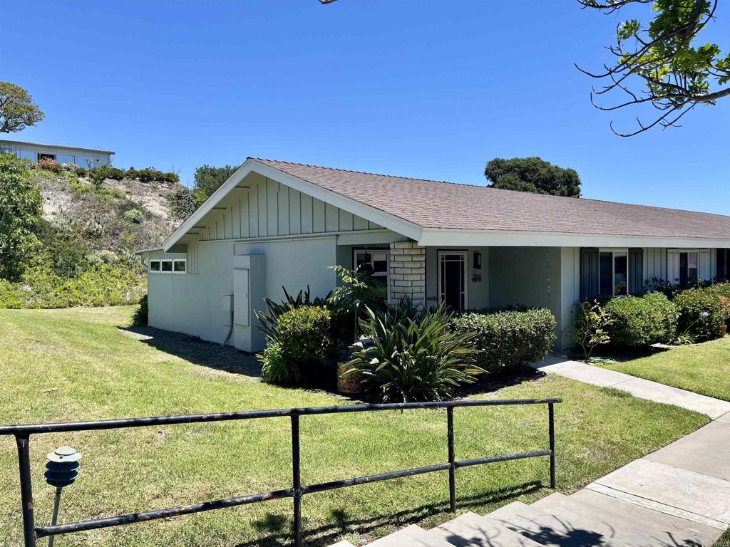 Welcome to this beautifully remodeled, move-in ready end unit in the highly desirable Oceana 55+ community in Oceanside. Light and bright throughout, this home features an additional 200 sq. ft. California Room, with built-in cabinetry and a full wall of windows showcasing peaceful greenbelt and hillside views. The updated kitchen boasts upgraded cabinetry, sleek countertops, tile backsplash, and stainless steel appliances. The spacious living room offers vaulted ceilings and flows seamlessly into the California Room, creating a perfect space for relaxing or entertaining. The large bedroom features a stylish sliding barn-door entry and a generous closet, while the fully remodeled bathroom adds a modern touch. Upgrades include dual-pane vinyl windows, solid wood interior doors, upgraded A/C with De-Humidifier, and a newer water heater. Enjoy resort style amenities including a clubhouse, pool, spa, dog park, pickleball, banquet facilities, card room, and RV parking. Conveniently located near shopping, dining, beaches, and the harbor- this is the best of active senior living!