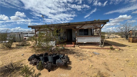Photo of 57179 Pine Street, Landers, CA 92285 (MLS # JT26234303)